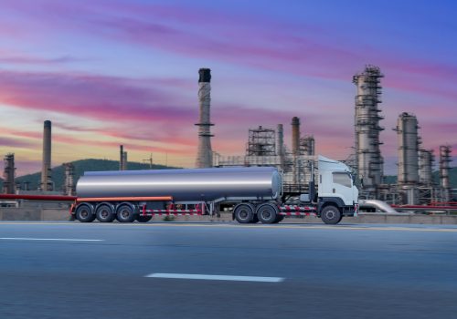 Gasoline tanker with fuel tanker truck shipping speed on high way road to delivery logistic business